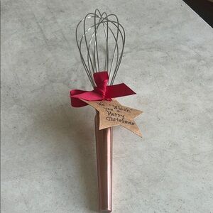 Elegant Copper Whisk with Red Ribbon